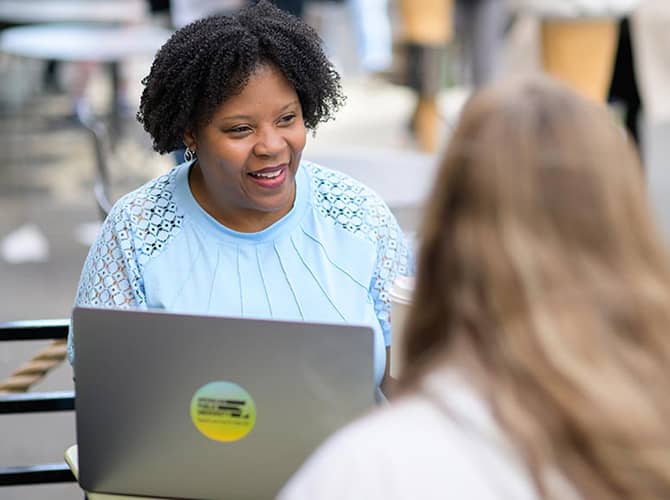 APU student working on laptop