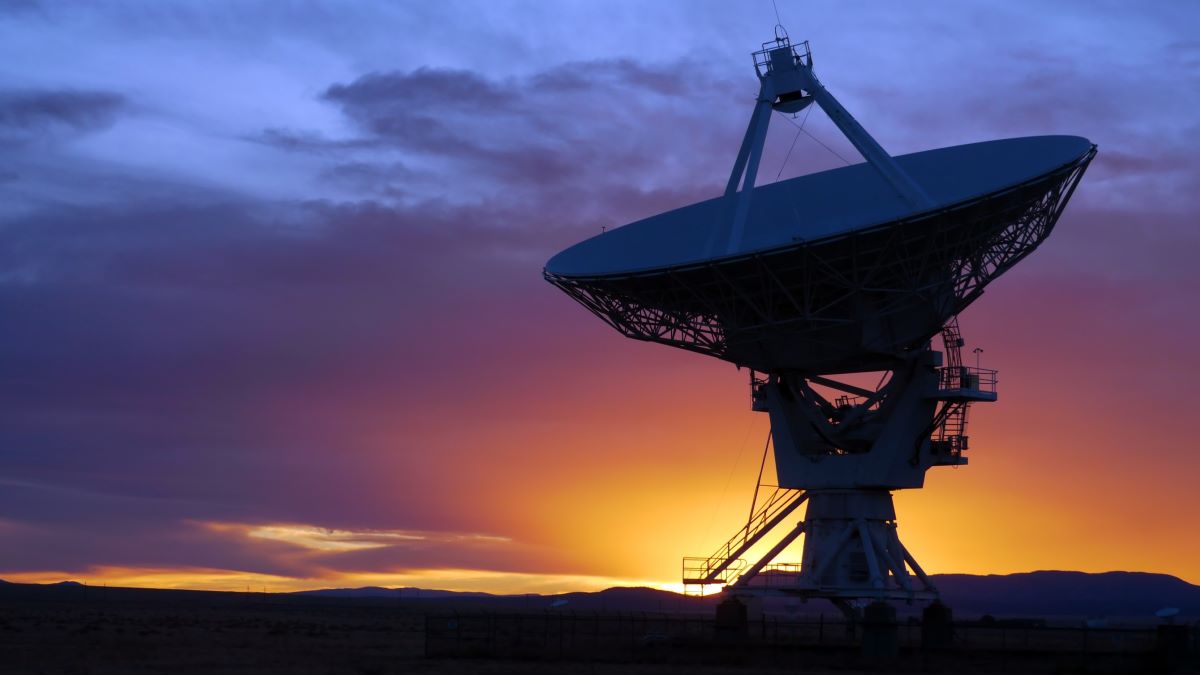 space telescope at sunset