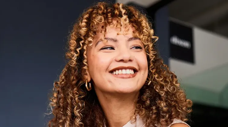 Woman smiling at colleague