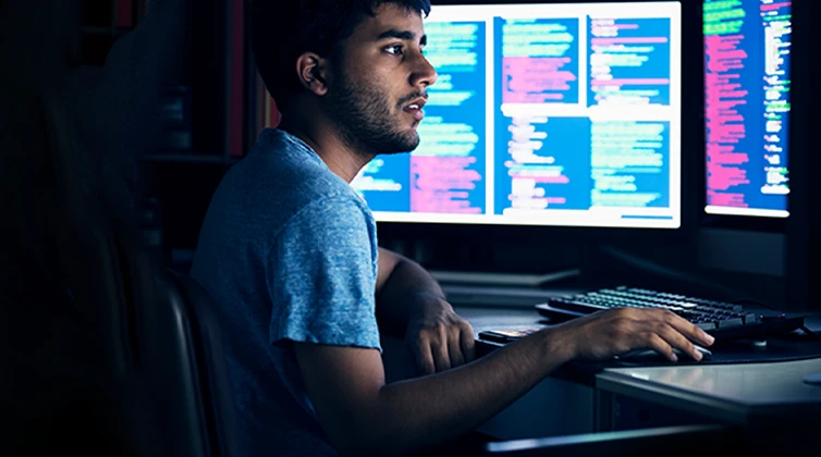 A man looking at computer