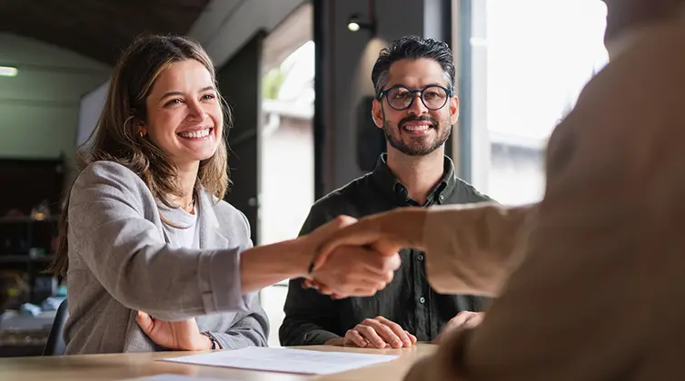 Two people shaking hands