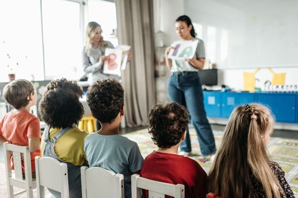 Early Childhood Education Teacher speaking to class