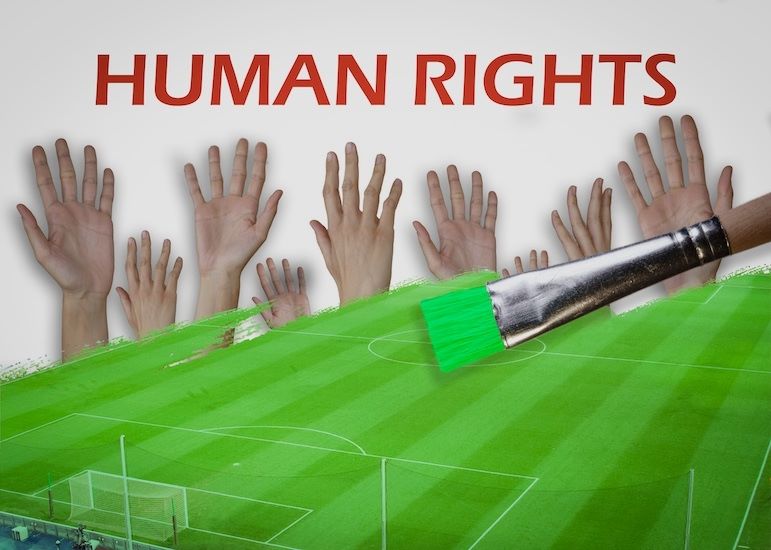sportswashing defined by teammates hands raised on soccer field