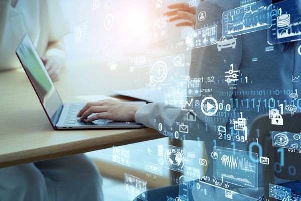 business analytics professional on laptop