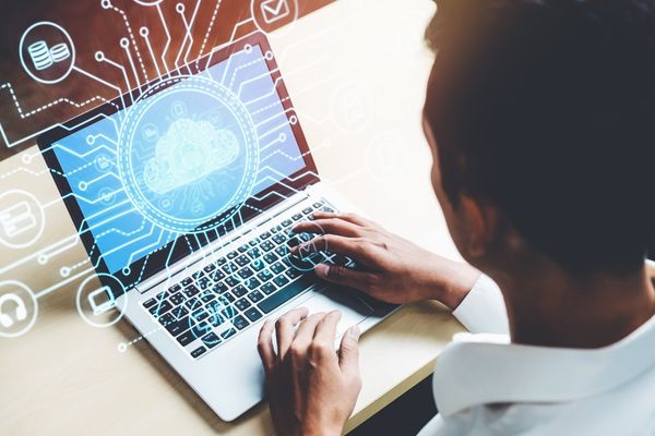 computer technology student on laptop
