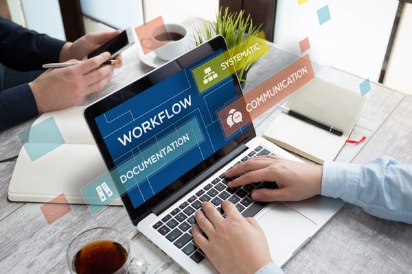 instructional designer working on laptop