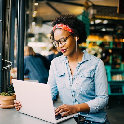 female student studying at computer